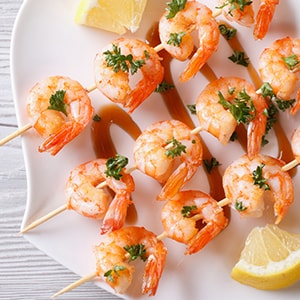 A plate of shrimps on skewers- beautiful and provide skin protection